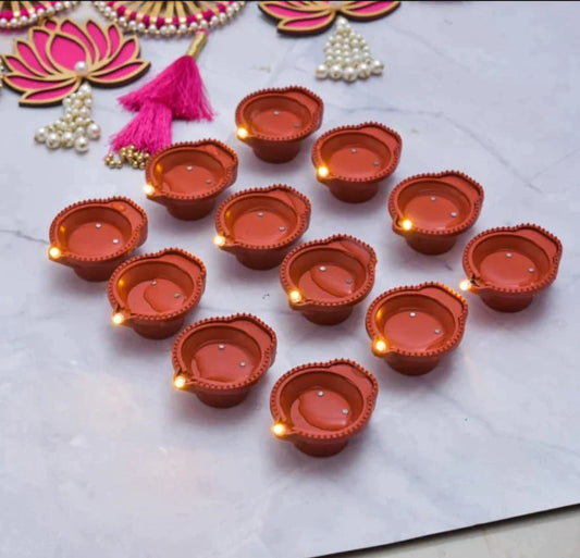 UK-0003    Water Sensor LED Diyas Candle with Water Sensing Technology E-Diya, Warm Orange Ambient Lights, Battery Operated